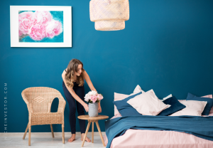 woman cleaning a teal room